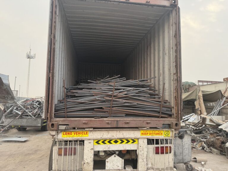 Steel scrap container loading on trailer – Malik Group, Abu Dhabi